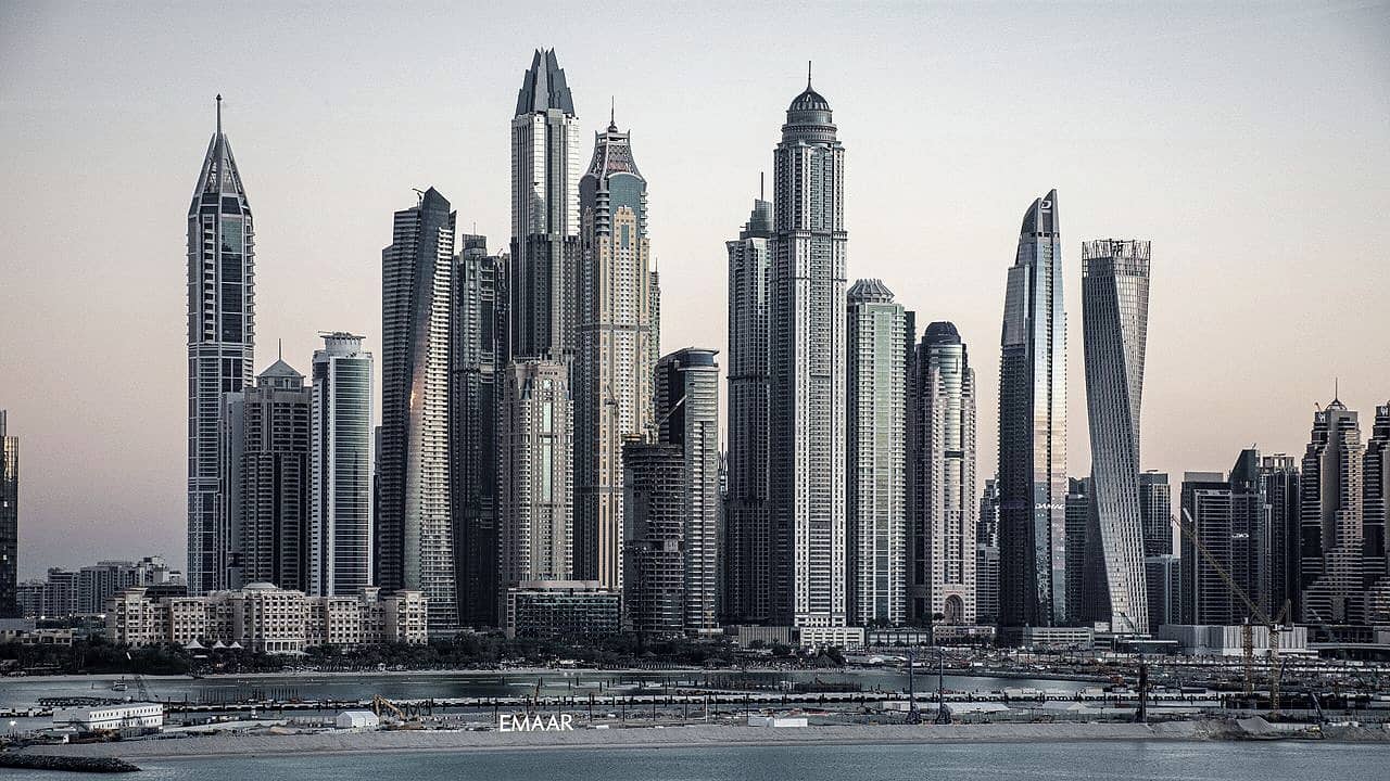 UAE waterfront skyline at dusk